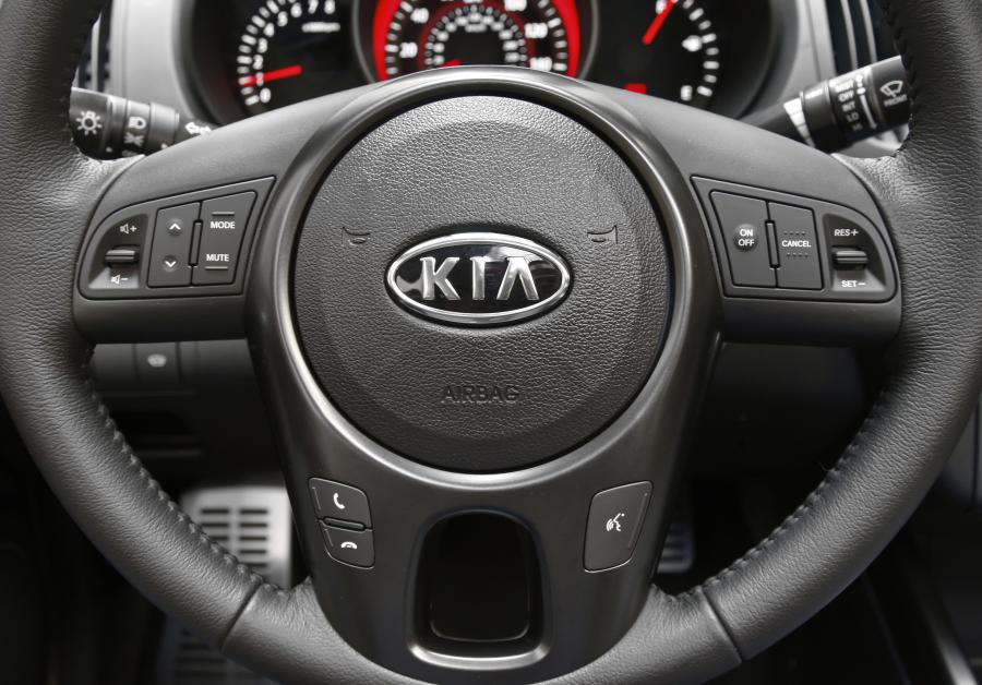  Kia Forte Koup 2009 года  (фото 143 из 169)